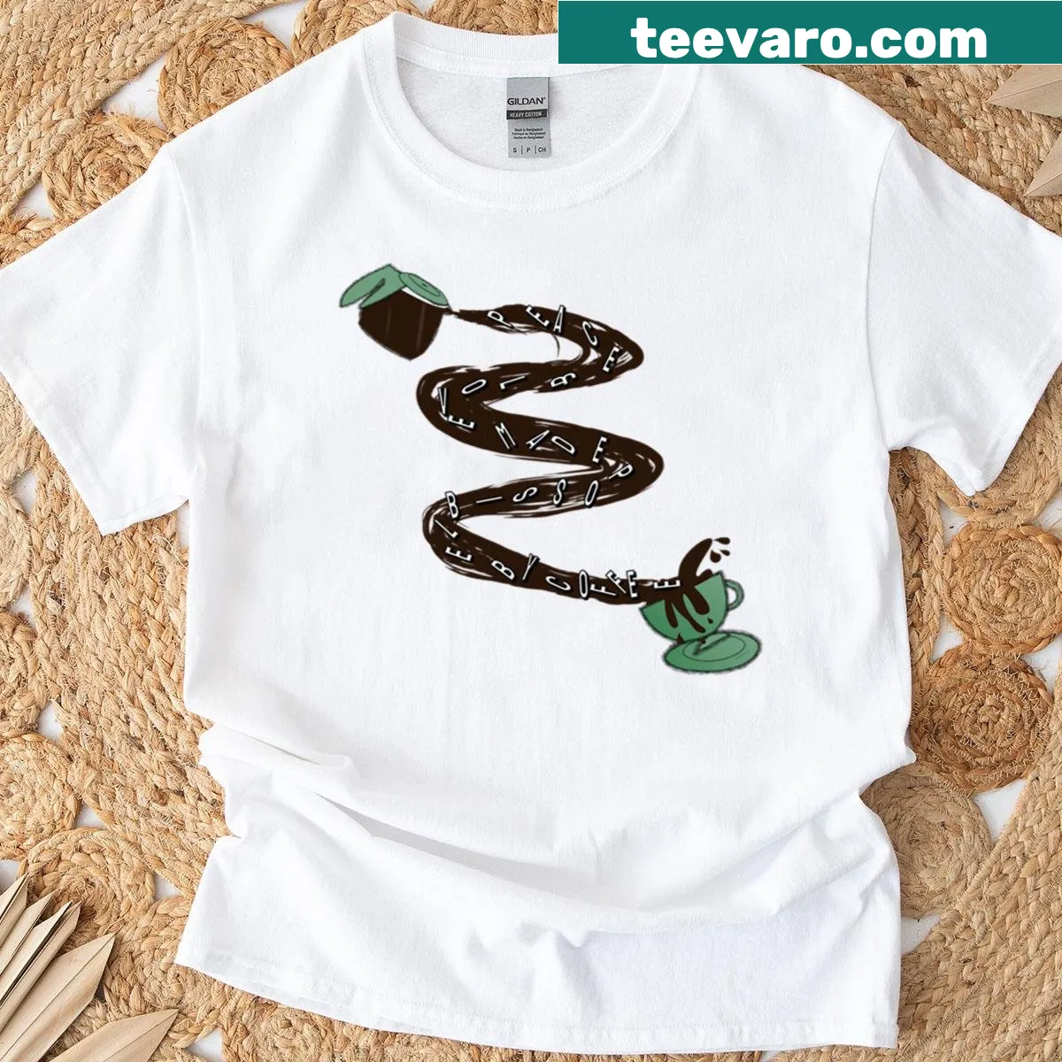 Inspirational T-shirt with the phrase 'Peace and Love Made Possible By Coffee' alongside coffee illustrations. — on a men's t-shirt