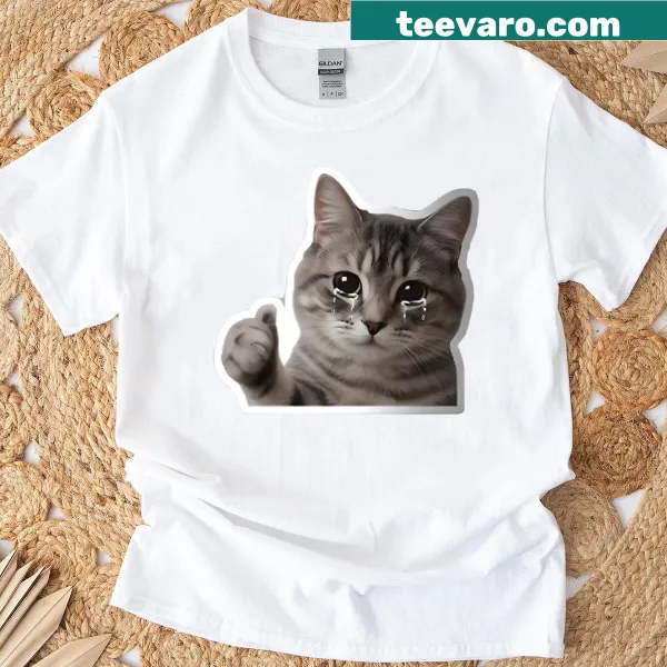 Funny t-shirt with a crying cat giving a thumbs up