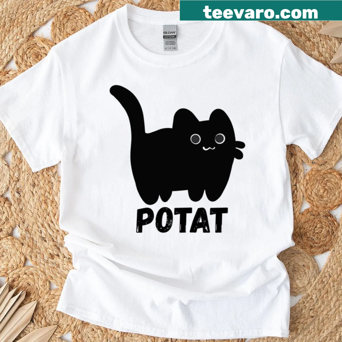 Oversized T-shirt with a cartoon of a fat black cat named Potat — on a men's t-shirt