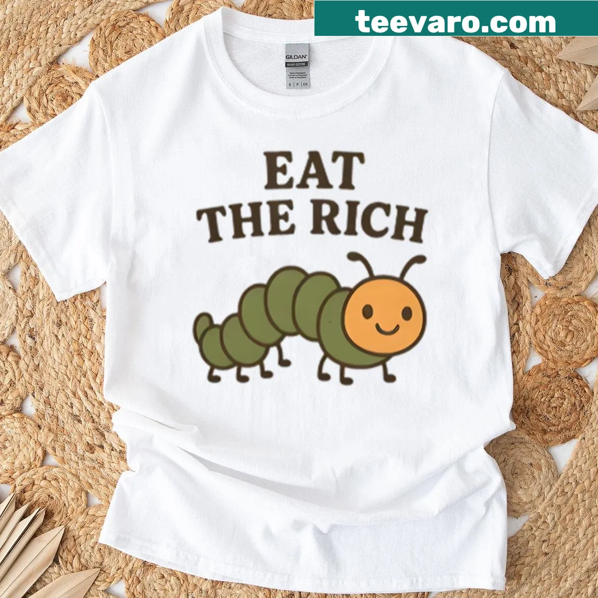 Graphic t-shirt featuring a hungry caterpillar with the text 'Eat The Rich' — on a men's t-shirt