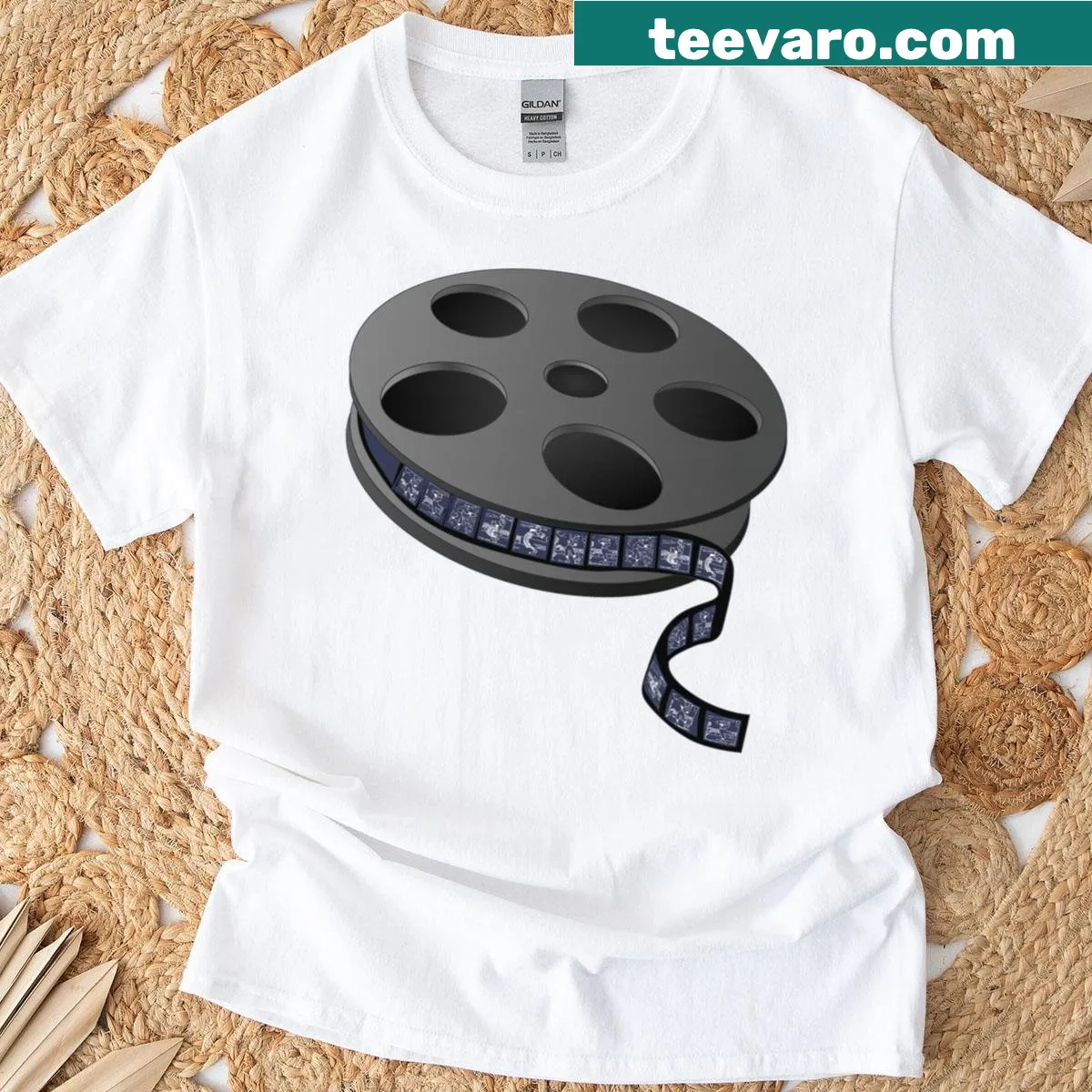 Artistic shirt featuring a film reel graphic celebrating cinema — on a men's t-shirt