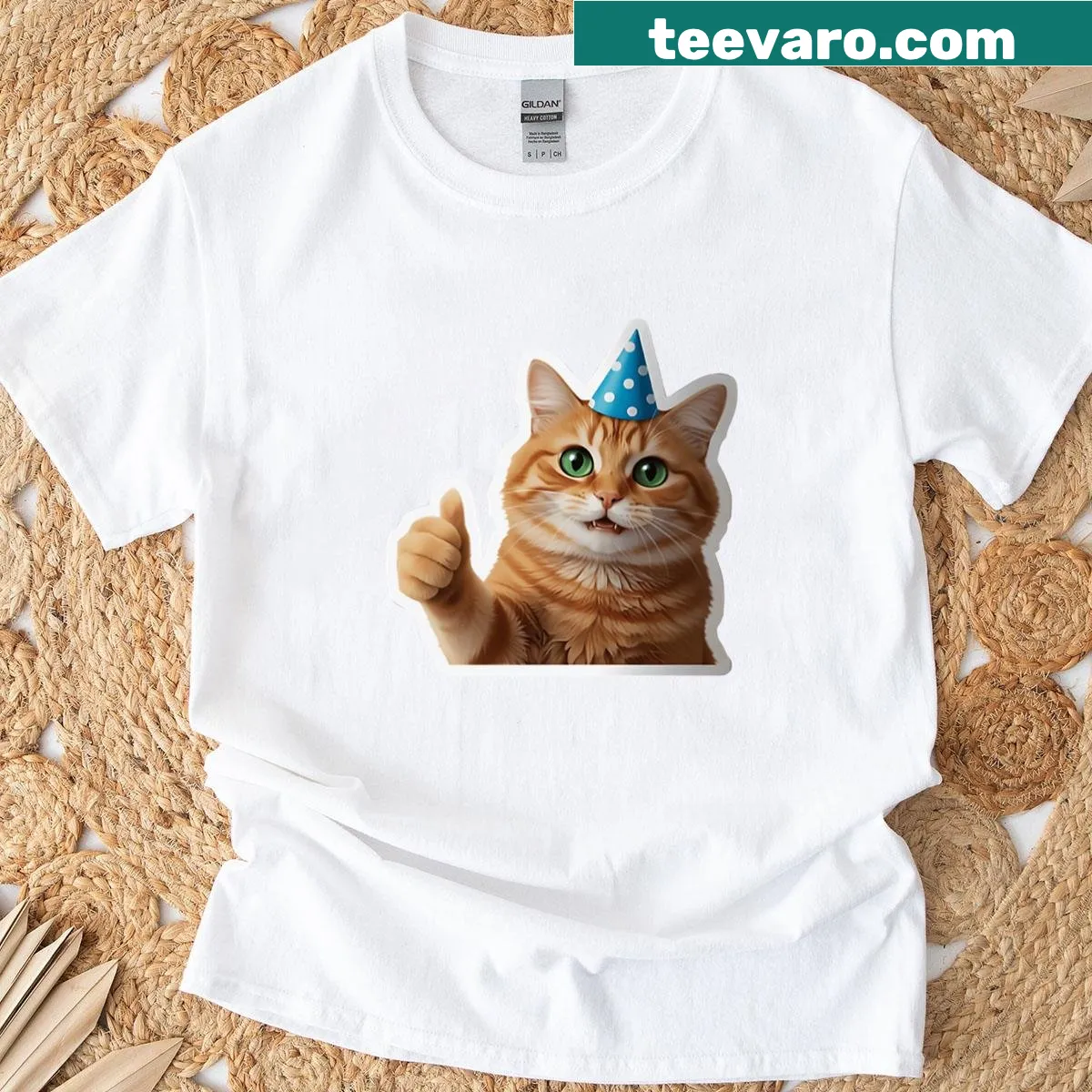 Whimsical cat in a party hat t-shirt — on a men's t-shirt
