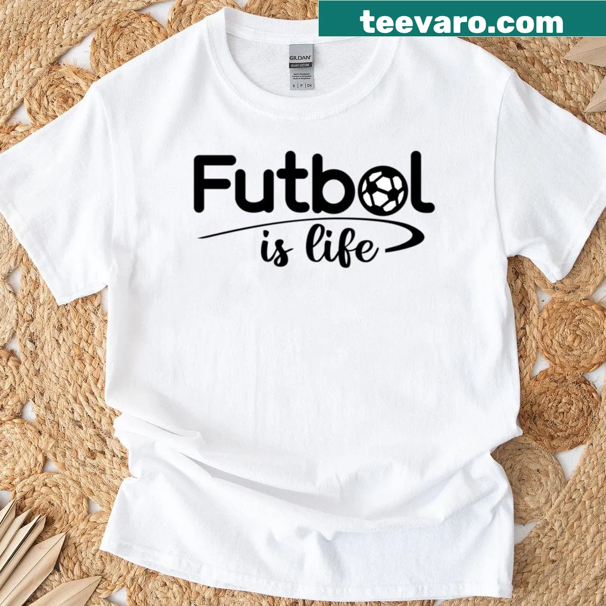 Playful t-shirt with bold text saying 'Futbol Is Life' — on a men's t-shirt