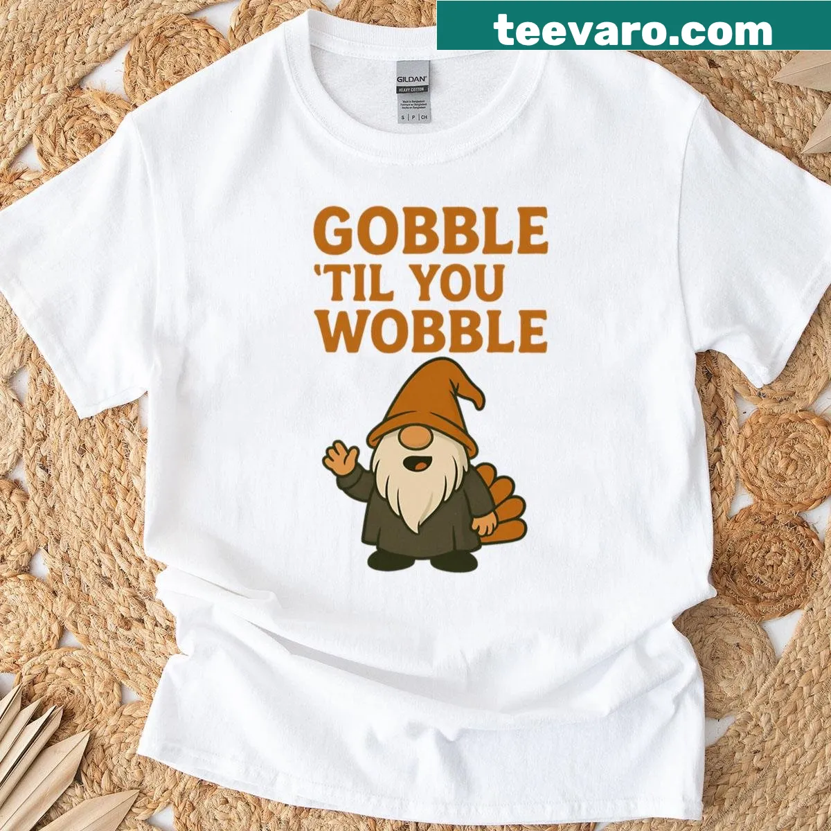 Funny Thanksgiving gnome t-shirt with turkey design and 'Gobble Til You Wobble' text — on a men's t-shirt