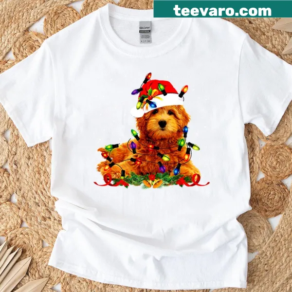 Festive Goldendoodle with reindeer lights graphic on a Christmas t-shirt.