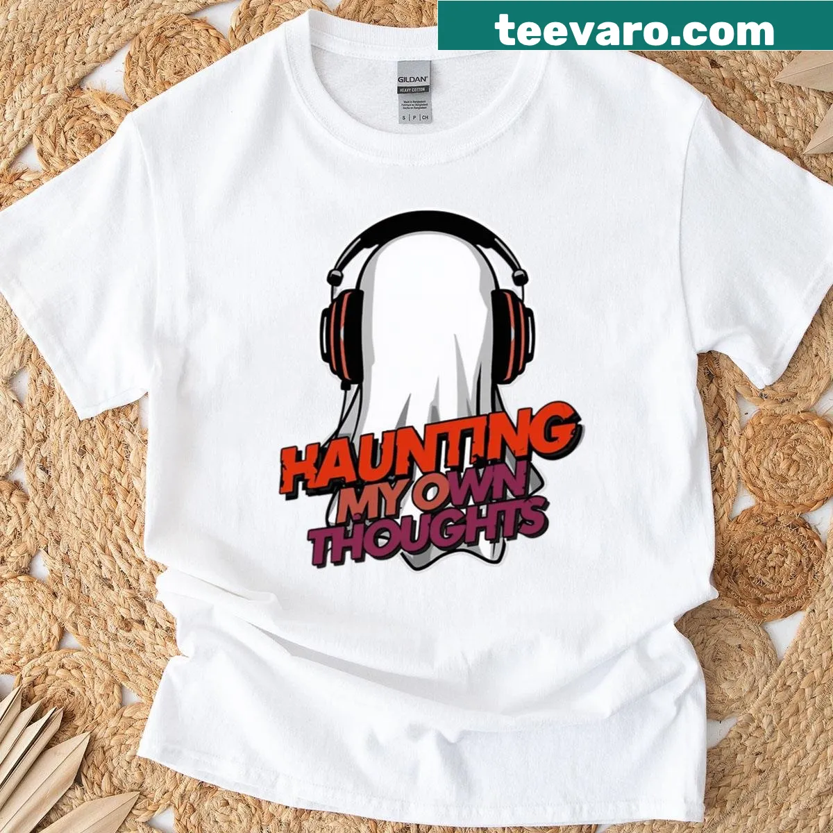 Minimalist t-shirt with ghost wearing headphones design — on a men's t-shirt