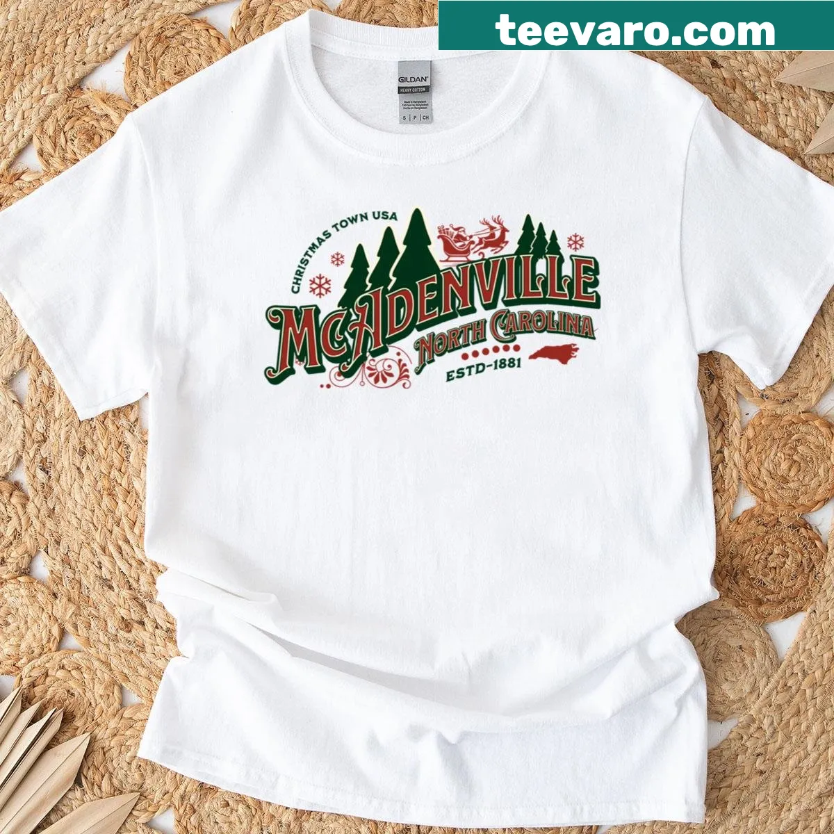 Vintage Christmas logo T-shirt representing McAdenville, North Carolina — on a men's t-shirt