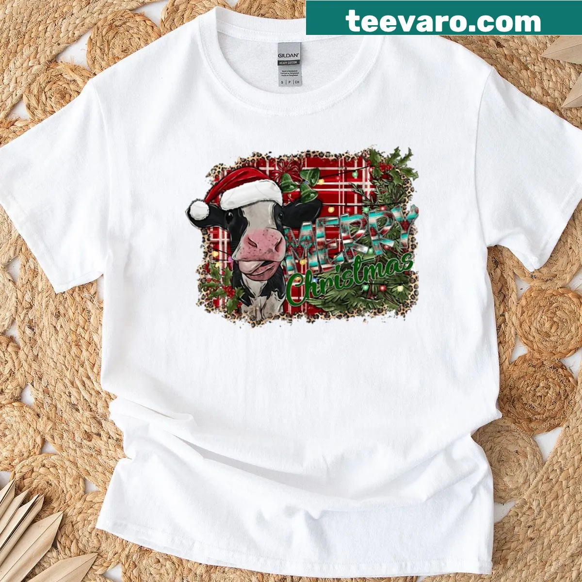 Cute cow graphic in Christmas attire for a festive look. — on a men's t-shirt