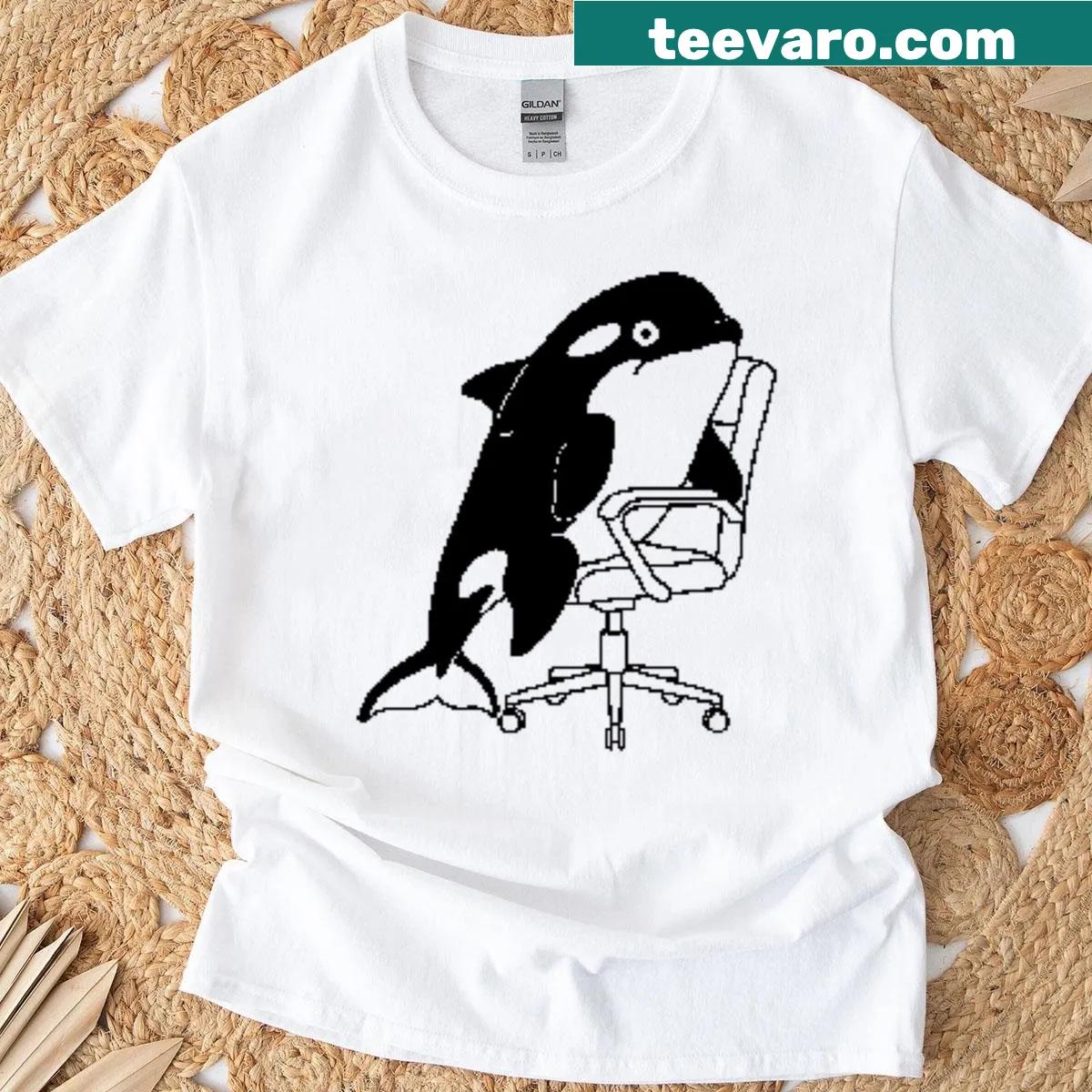 Whimsical orca illustration on a t-shirt — on a men's t-shirt