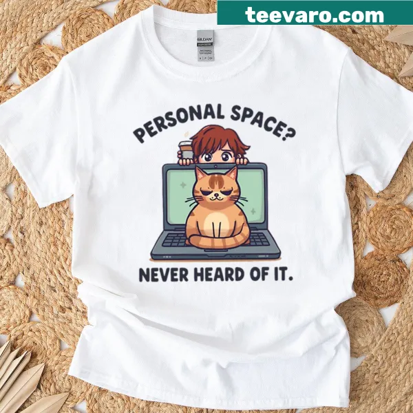Cat lounging on a laptop graphic t-shirt