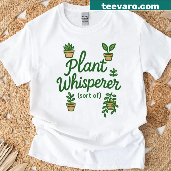 T-shirt featuring the phrase 'Plant Whisperer Sort Of' with plant graphics