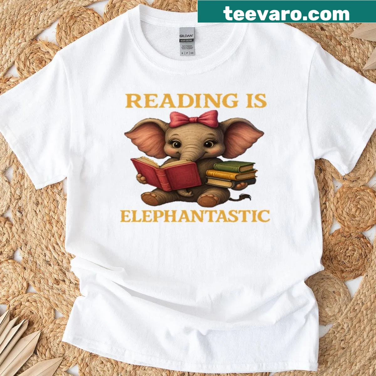 Cute elephant with a book graphic on oversized t-shirt — on a men's t-shirt