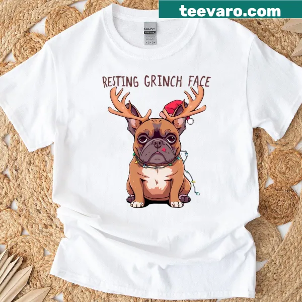 French Bulldog with reindeer antlers and 'Resting Grinch Face' text