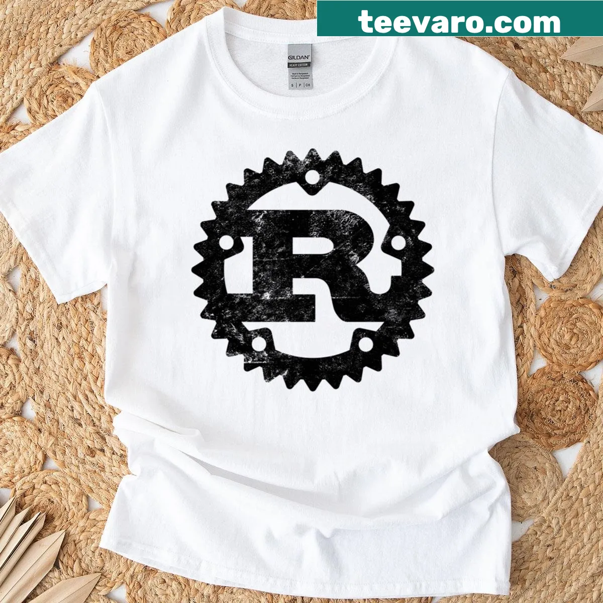 Distressed vintage Rust programming logo on T-shirt — on a men's t-shirt