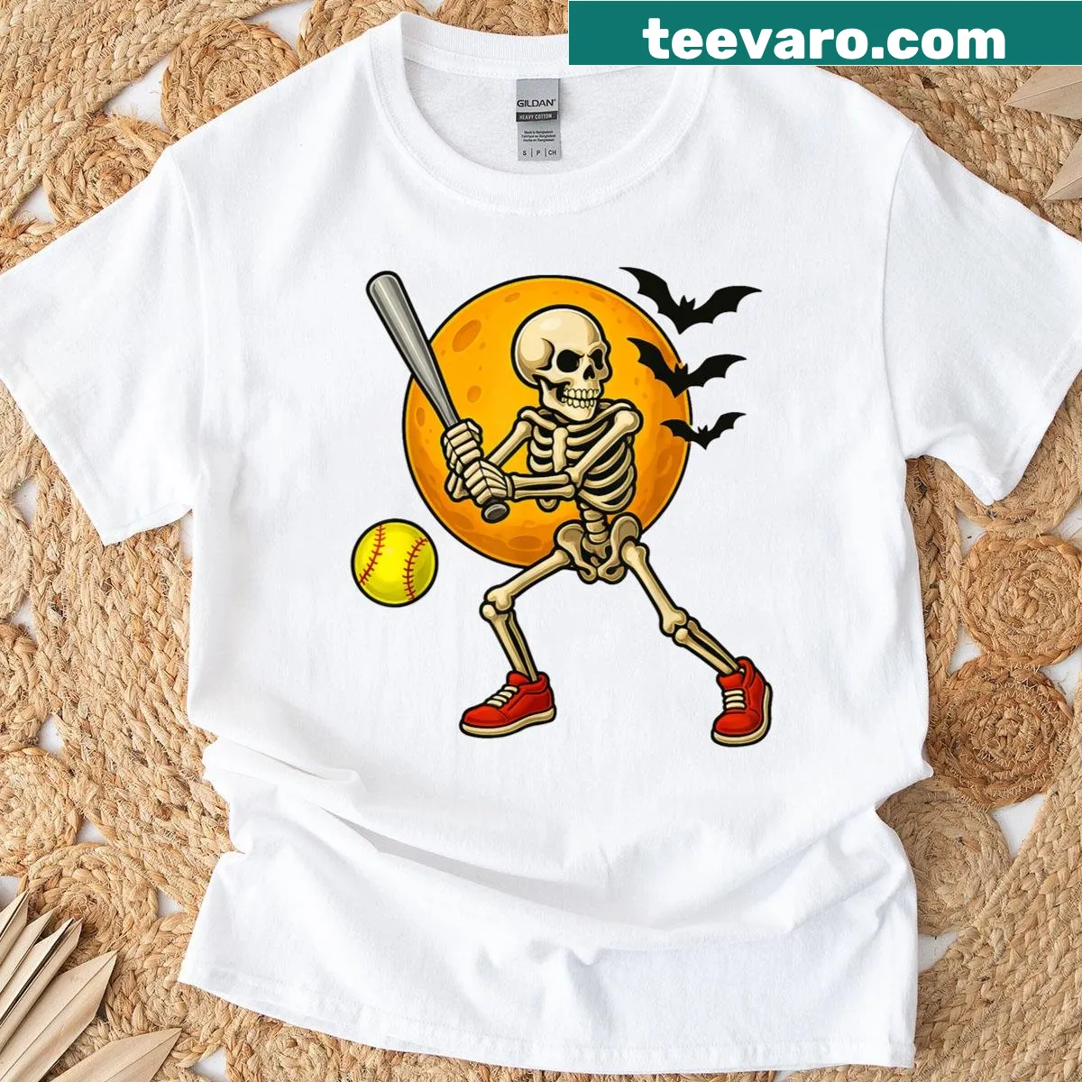 Skeleton in softball gear with a moon graphic on T-shirt — on a men's t-shirt