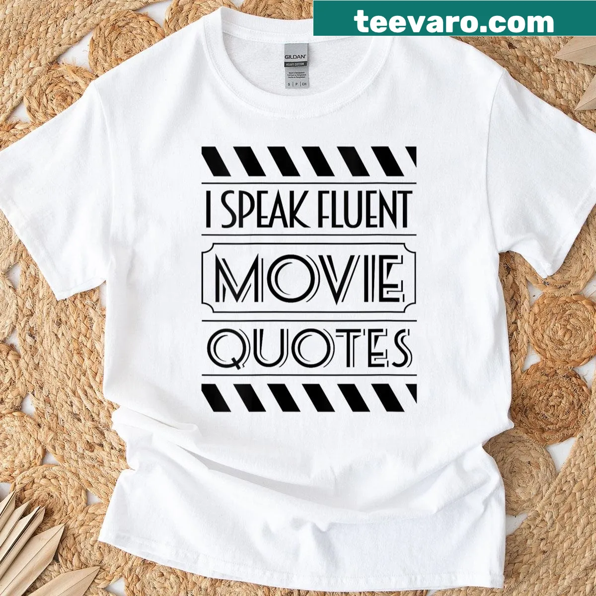 Funny shirt stating 'I Speak Fluent Movie Quotes' in playful font — on a men's t-shirt