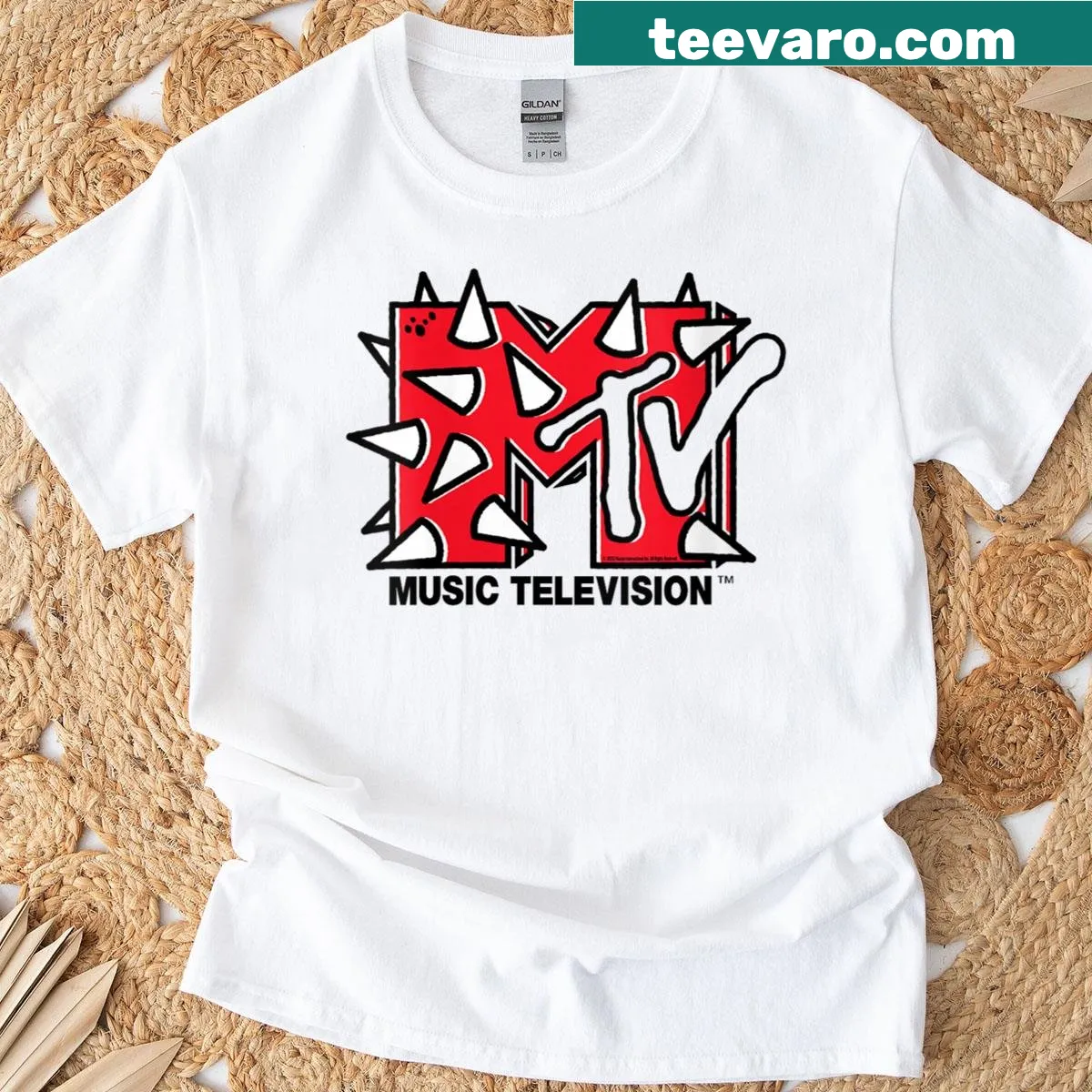 Edgy MTV logo with spikes on a women's T-shirt — on a men's t-shirt