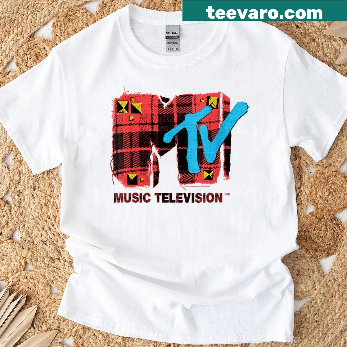 MTV logo t-shirt with punk spikes and plaid design — on a men's t-shirt