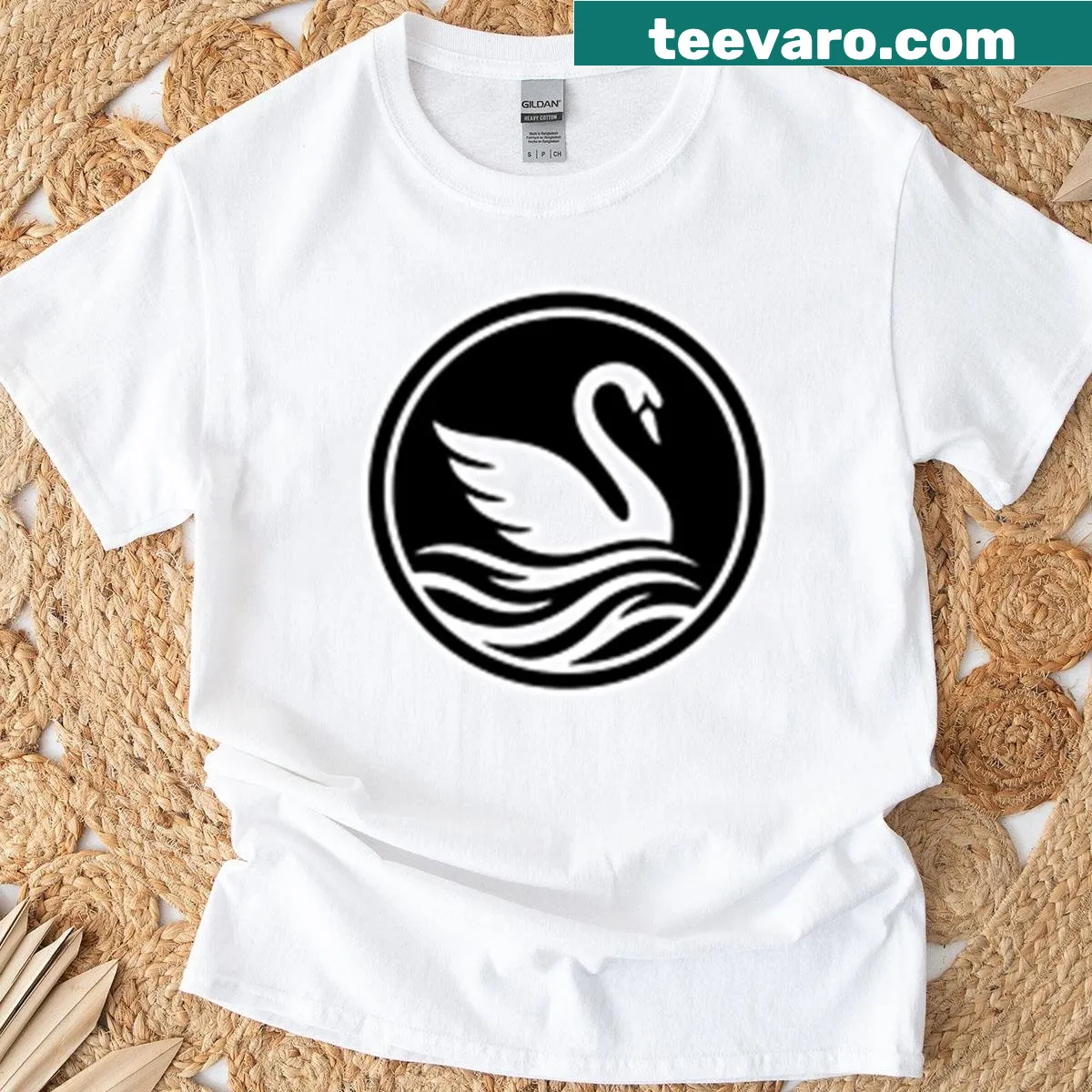 Minimalist black and white swan emblem on a T-shirt — on a men's t-shirt