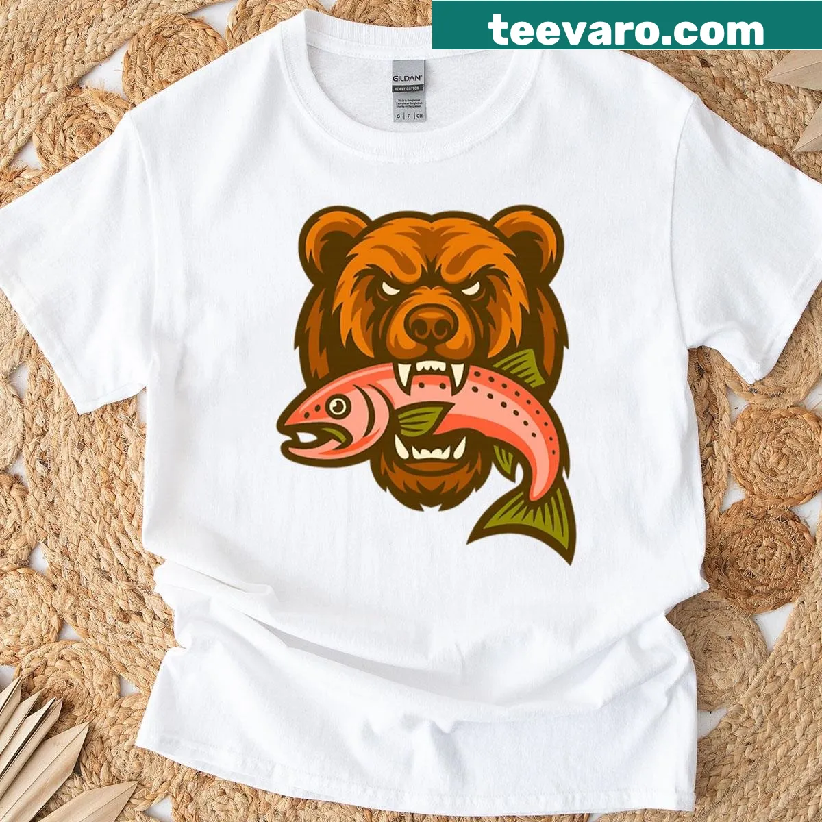 Illustration of a brown bear with glowing eyes and a salmon, wilderness theme — on a men's t-shirt