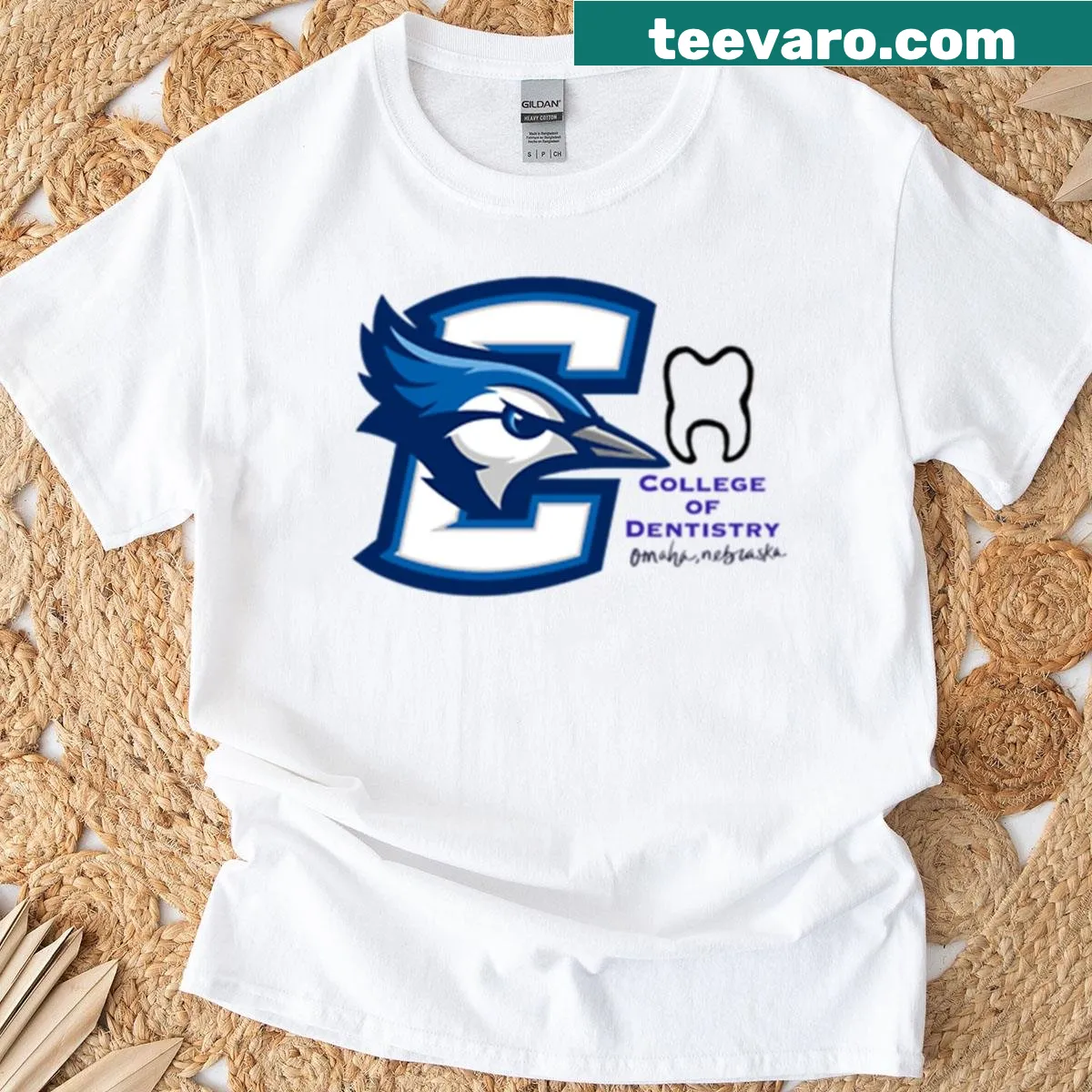 Oversized t-shirt with Creighton University College of Dentistry design — on a men's t-shirt
