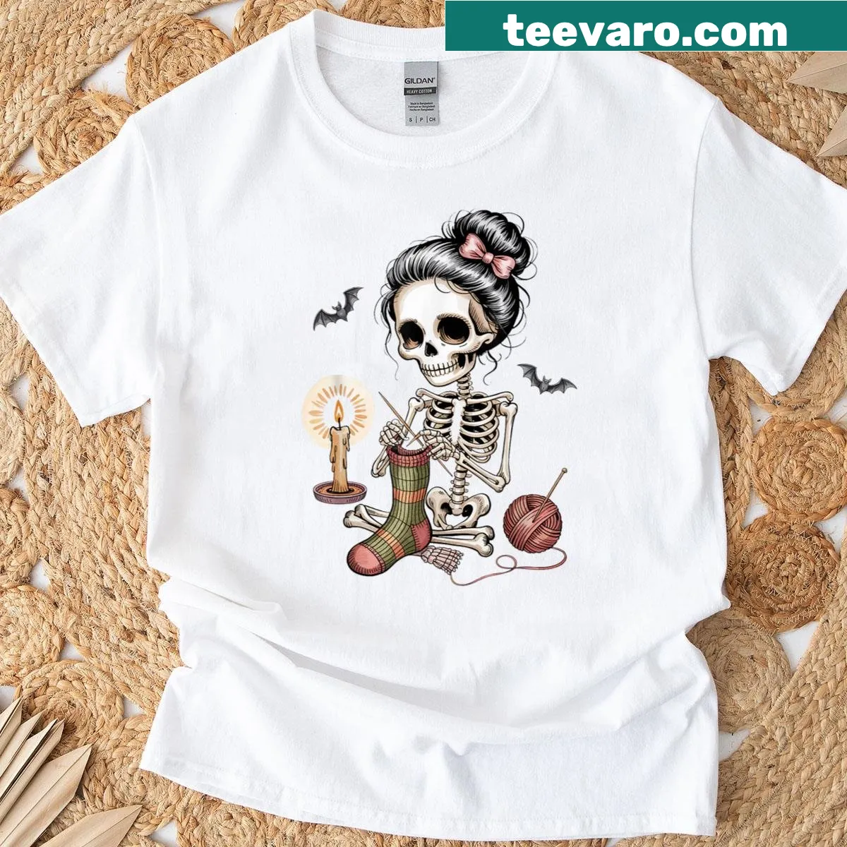 Cute skeleton knitting with colorful yarn for Halloween. — on a men's t-shirt