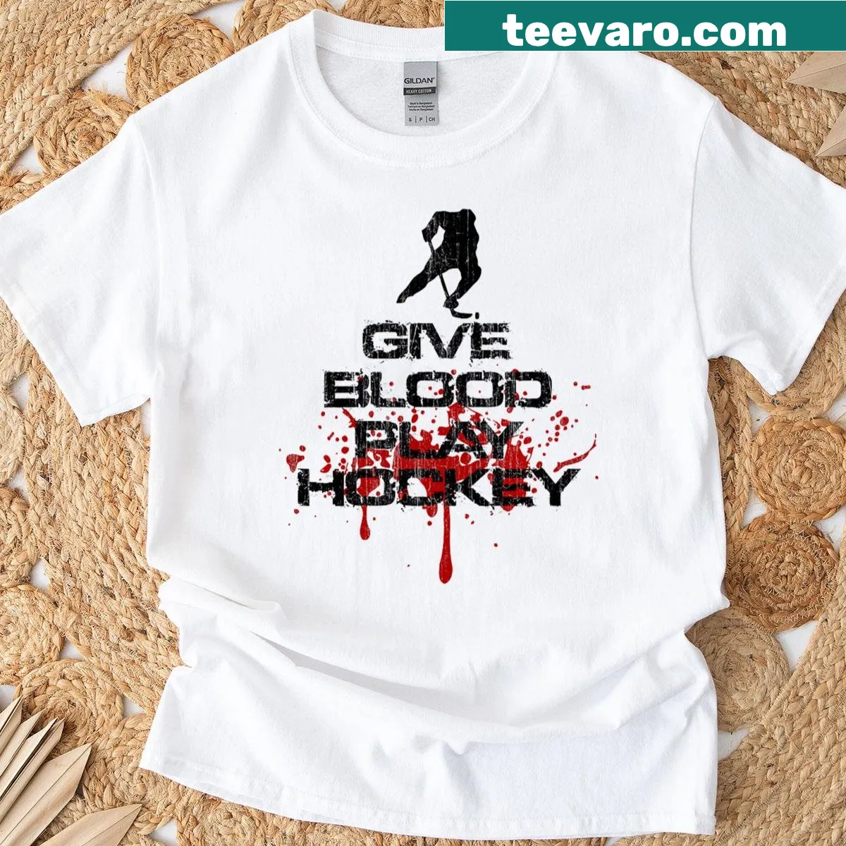 Graphic T-shirt featuring an ice hockey player with motivational text — on a men's t-shirt