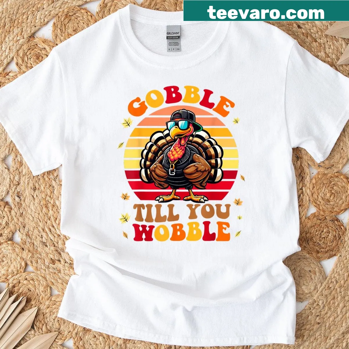 Funny Thanksgiving t-shirt with the phrase 'Gobble Til You Wobble' — on a men's t-shirt