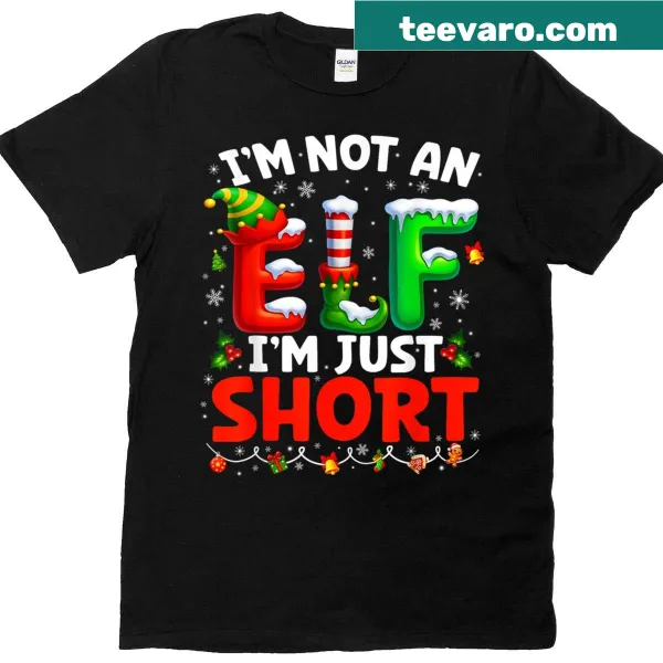 Funny Christmas t-shirt for kids with the phrase I'm Not An Elf Im Just Short