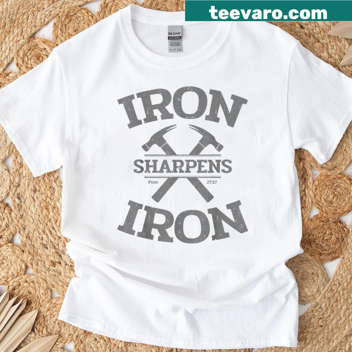 Inspirational T-shirt with 'Iron Sharpens Iron' text for workouts — on a men's t-shirt