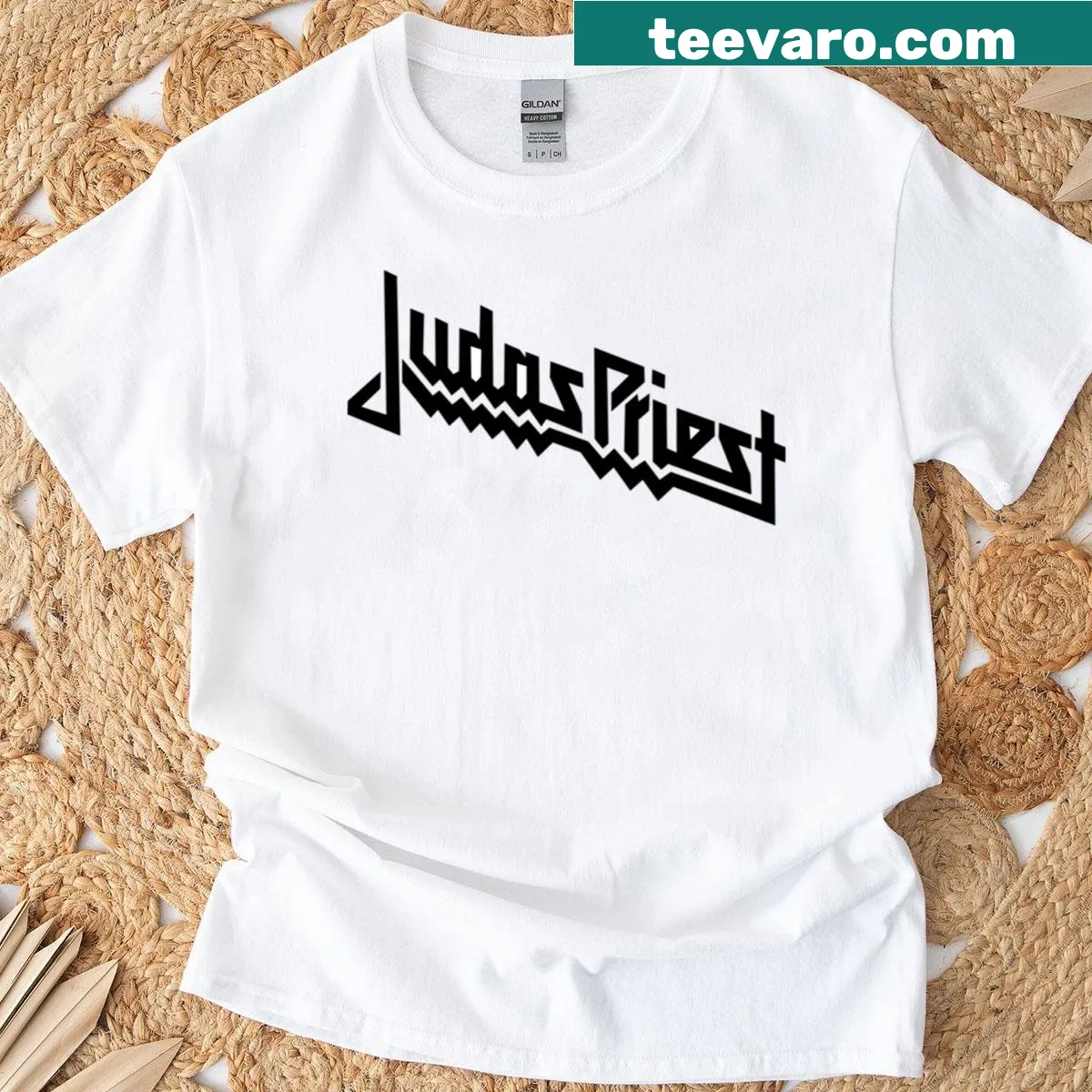 Oversized T-shirt featuring the Judas Priest band logo and heavy metal artwork — on a men's t-shirt