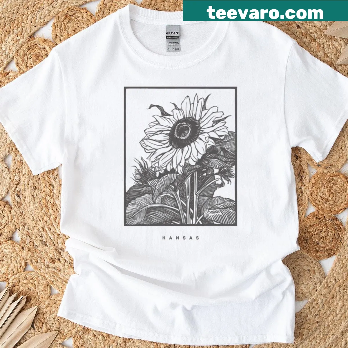 Oversized T-shirt featuring a sunflower graphic representing Kansas — on a men's t-shirt