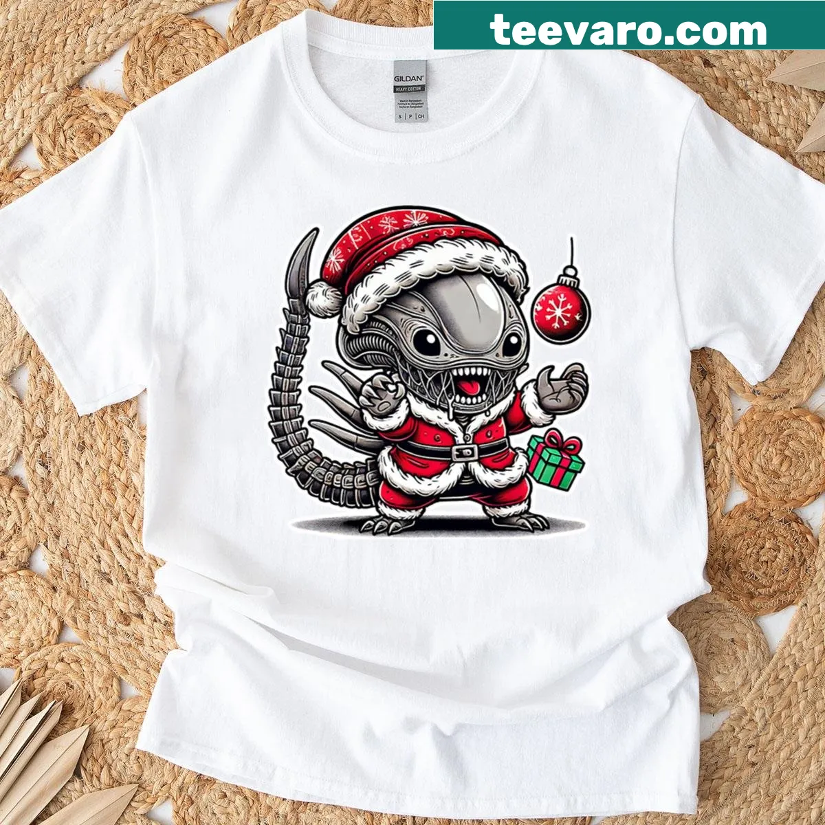 Kawaii-style Xenomorph as Santa Claus graphic t-shirt — on a men's t-shirt