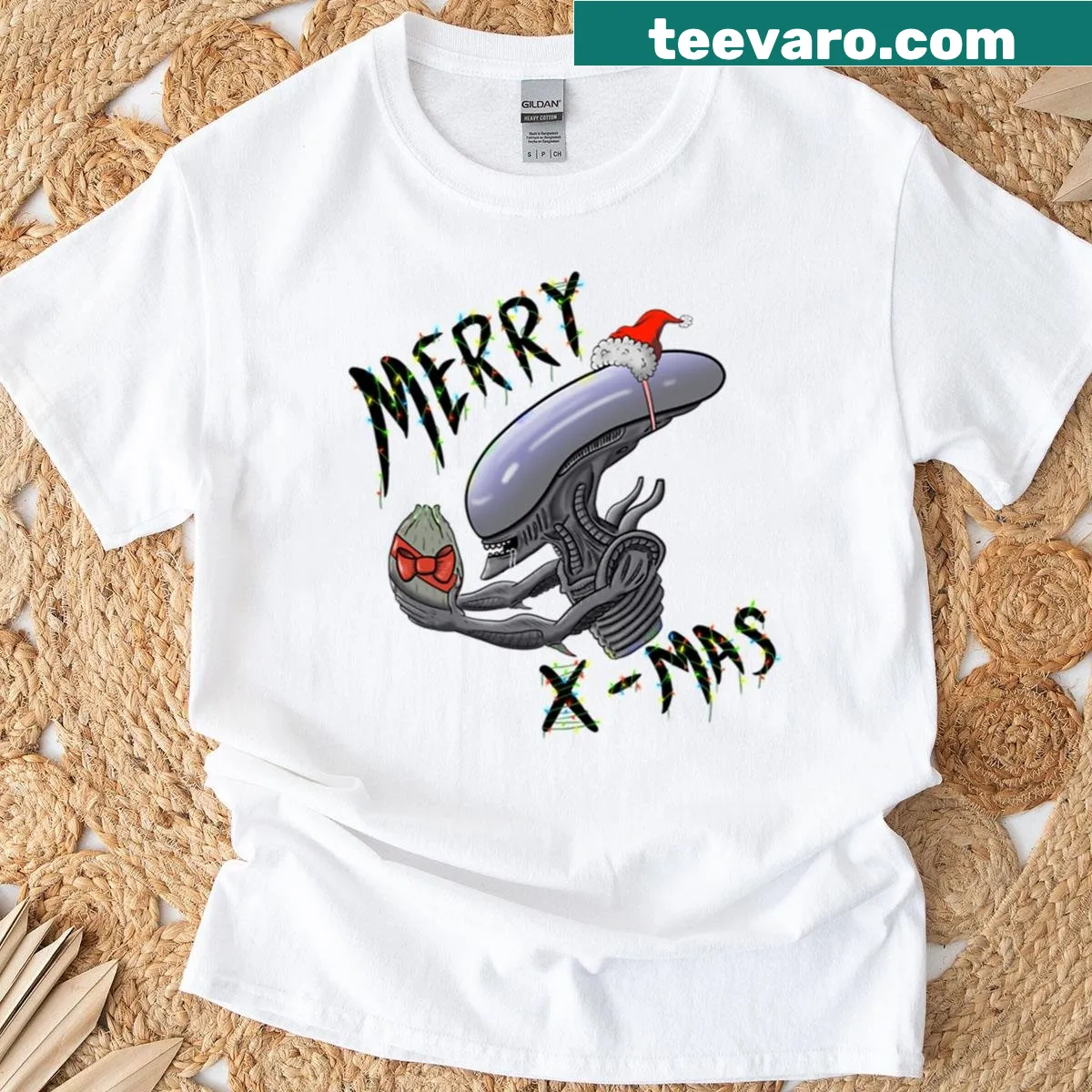 Funny Christmas T-shirt featuring xenomorph design — on a men's t-shirt