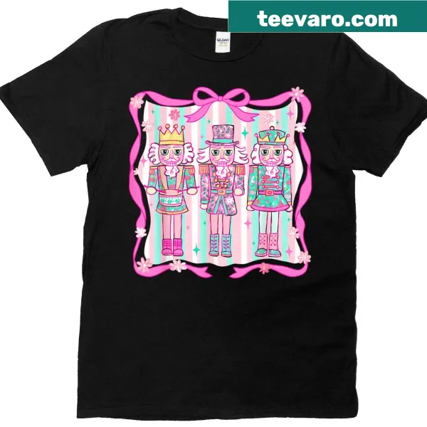 Illustrated pink nutcrackers with coquette bows on holiday-themed shirt
