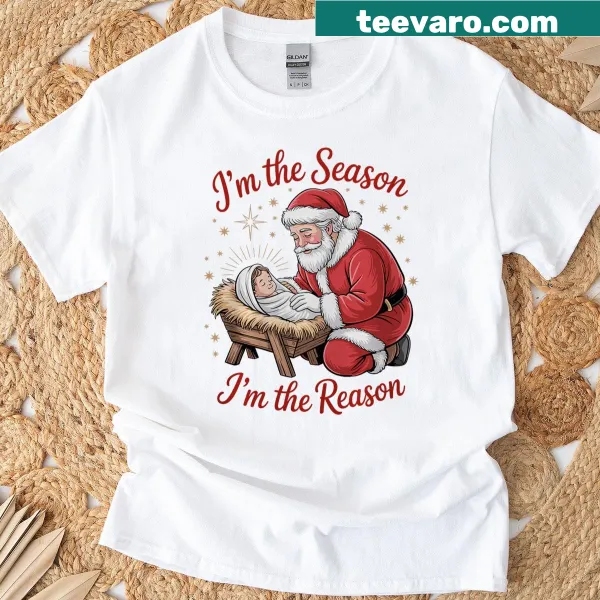 Humorous holiday shirt featuring Santa and Baby Jesus in a playful scene.