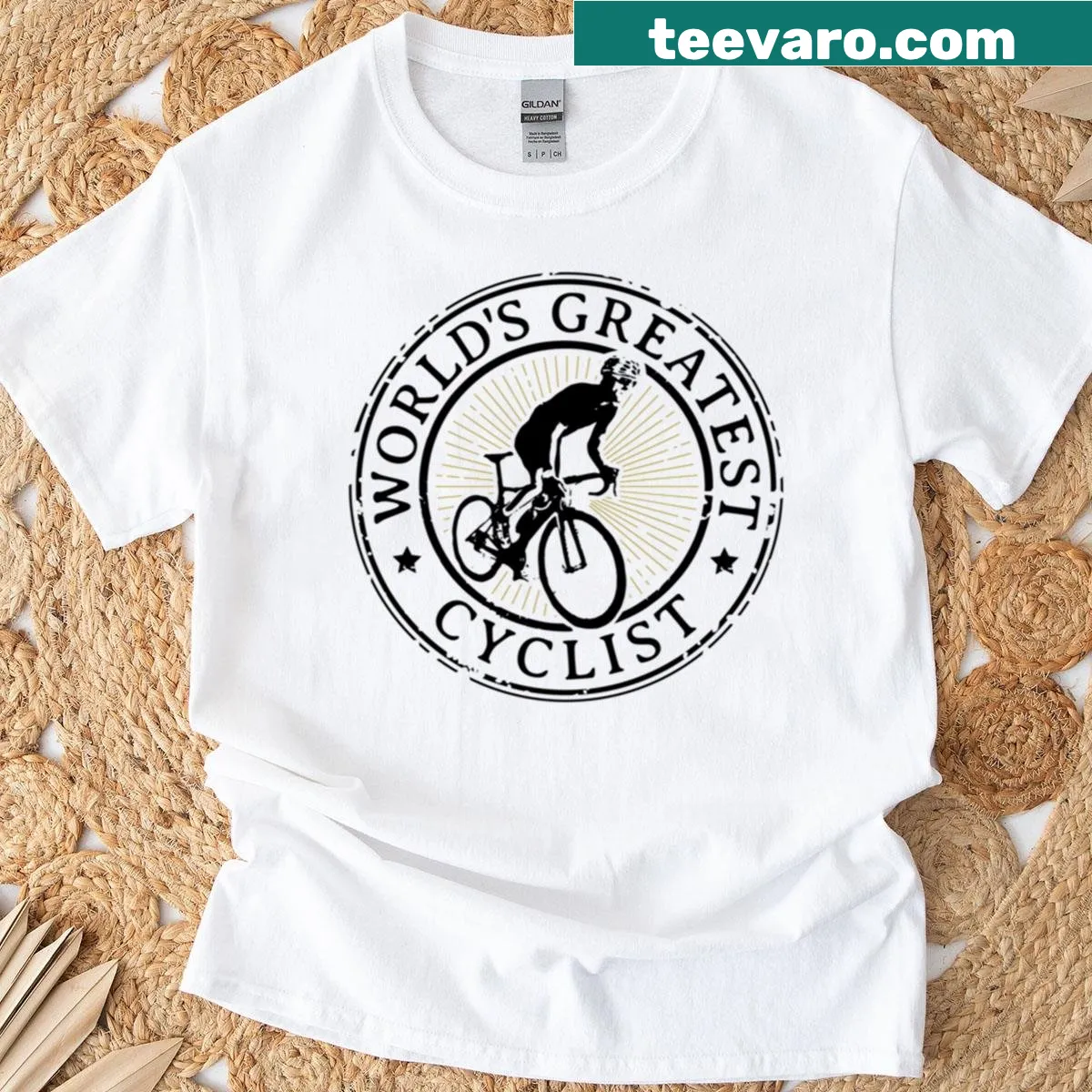 Vintage badge design celebrating cycling with a cyclist graphic — on a men's t-shirt