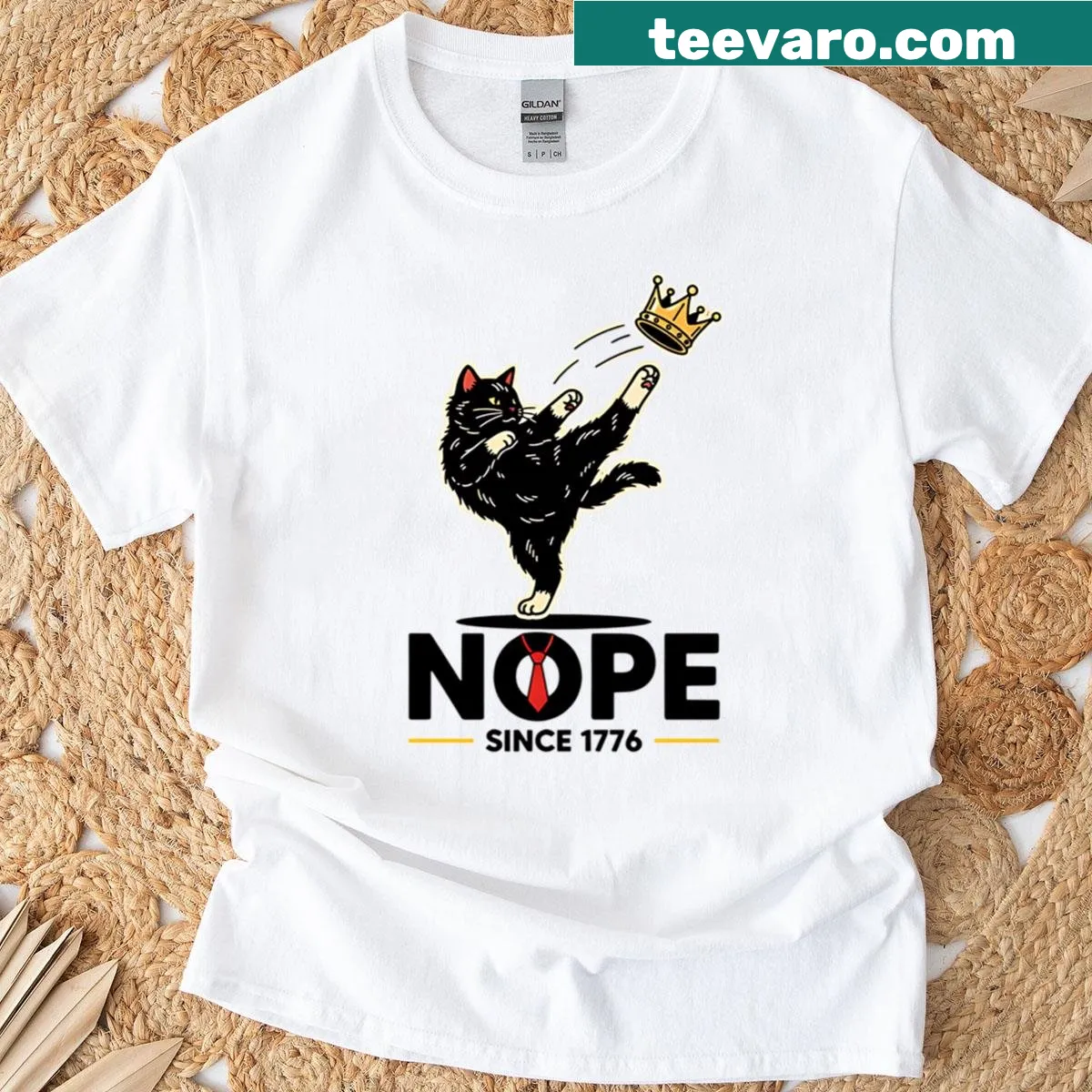 Funny cat kicking crown design T-shirt with whimsical art — on a men's t-shirt