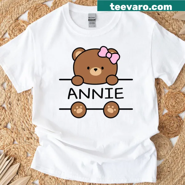 Cartoon bear with a name tag on a t-shirt