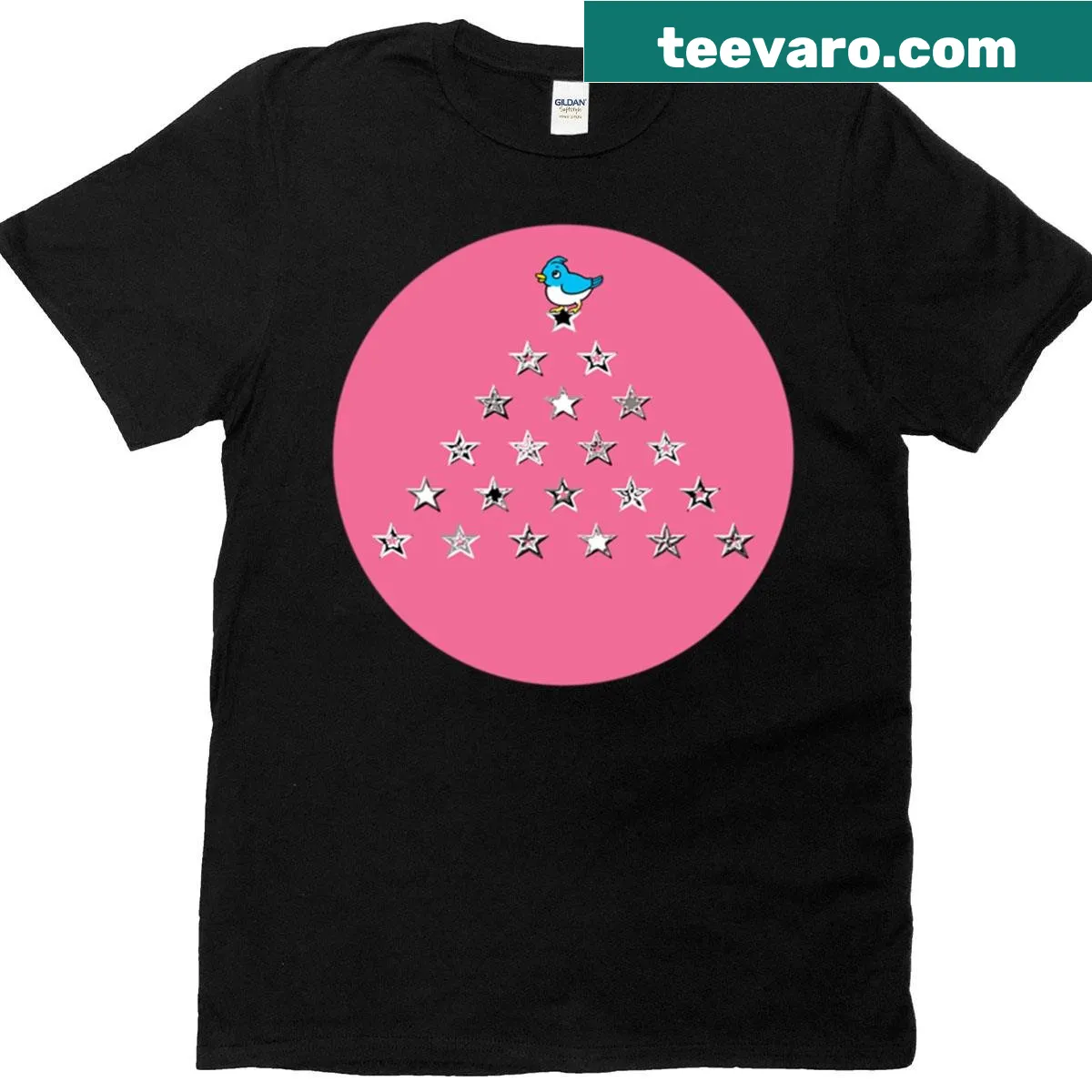 Illustrated t-shirt featuring a blue bird on a mountain under stars — on a men's t-shirt