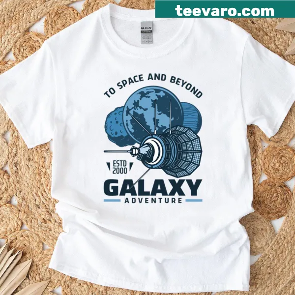 Shirt with a graphic of a spaceship exploring the galaxy.