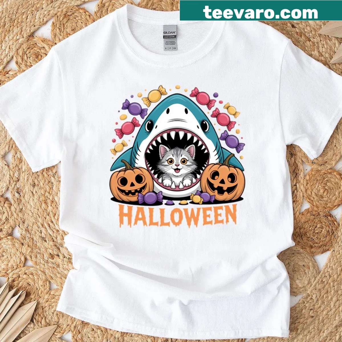 Illustration of a cat in a shark costume with Halloween pumpkin candy — on a men's t-shirt