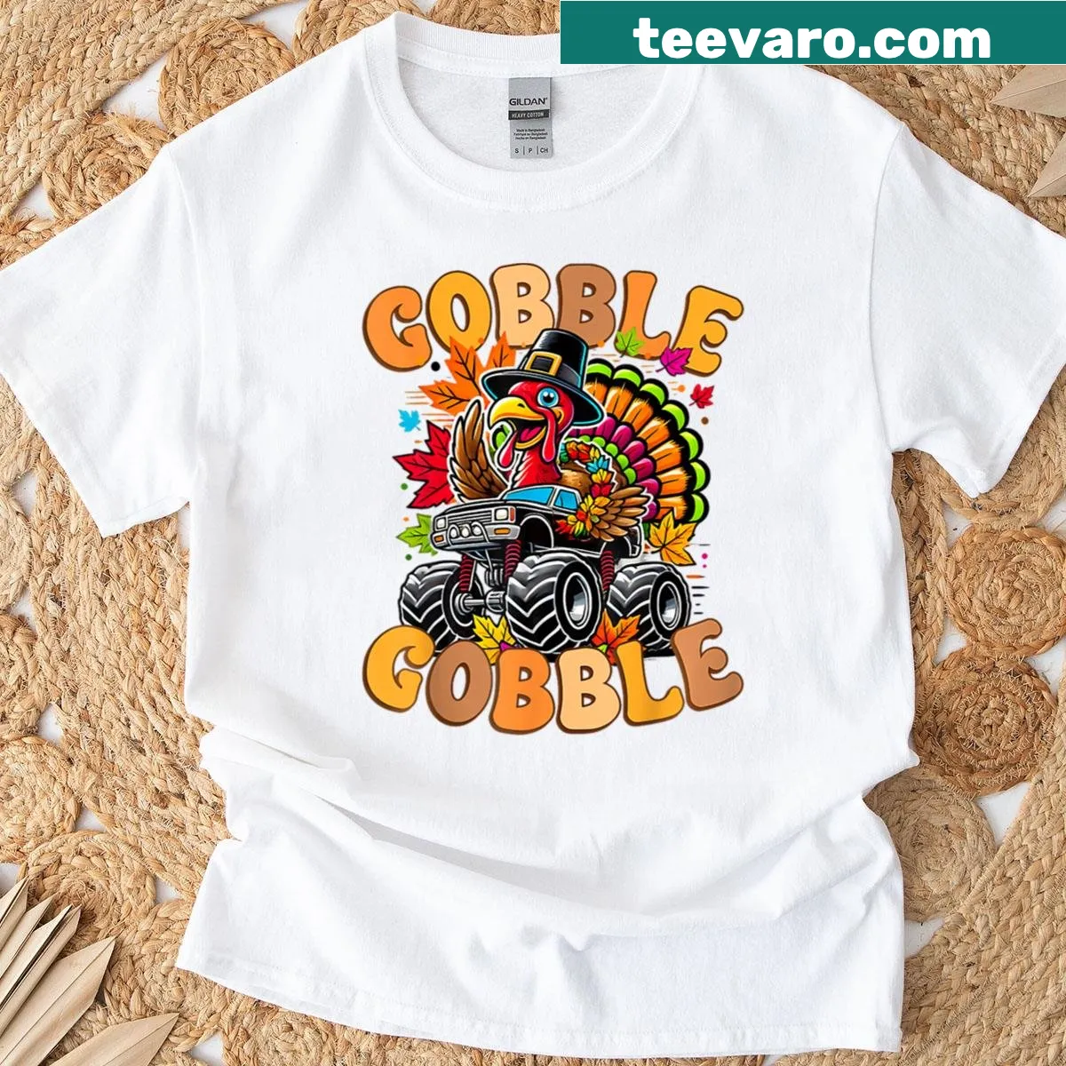 Turkey driving a monster truck on a Thanksgiving t-shirt — on a men's t-shirt