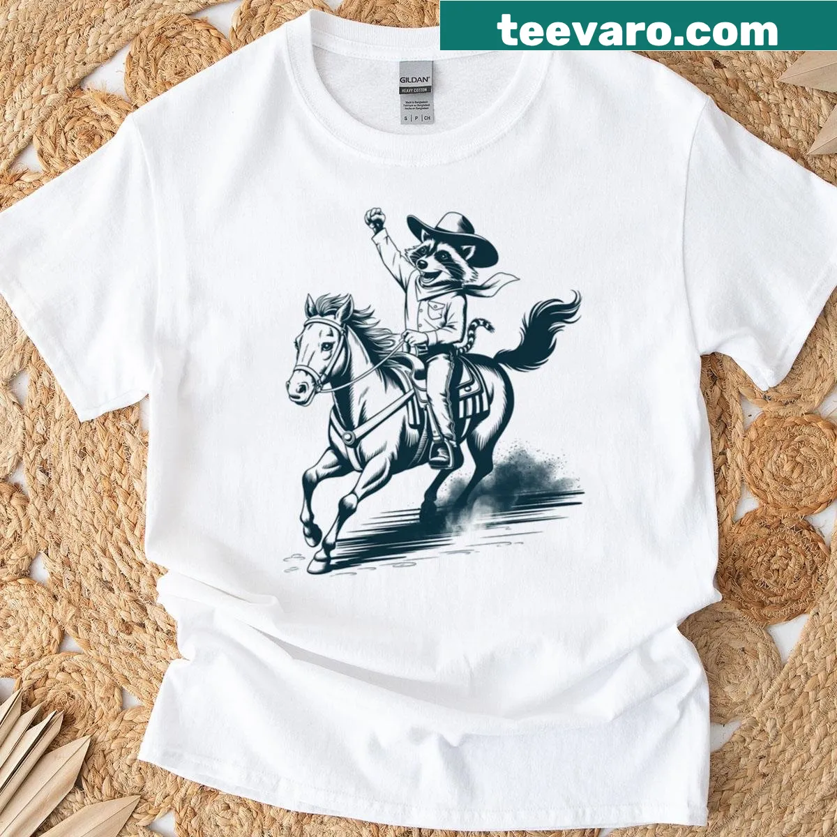 Cartoon cowboy raccoon riding a rodeo bull on a T-shirt. — on a men's t-shirt