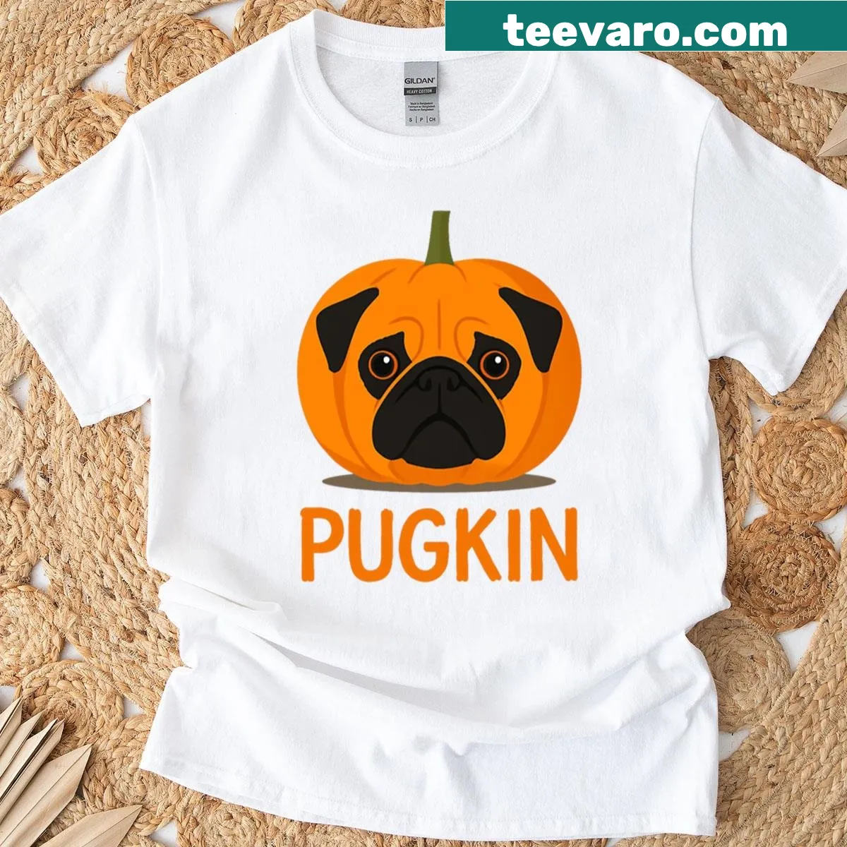 Illustrated Halloween pug and pumpkin design on T-shirt — on a men's t-shirt
