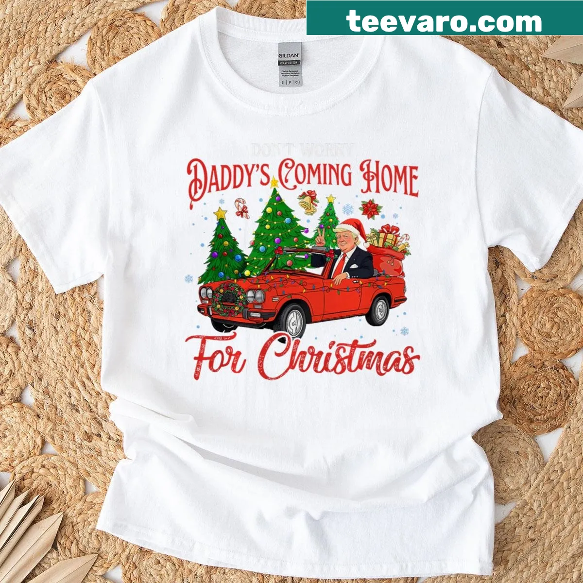 Typography t-shirt with 'Daddy's Coming Home For Christmas' and Trump 2024 — on a men's t-shirt