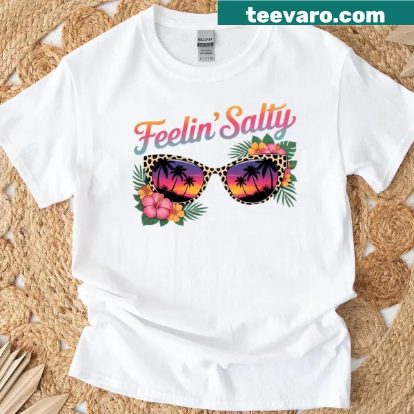 Beach-themed T-shirt with flowers, leopard, and sunglasses design