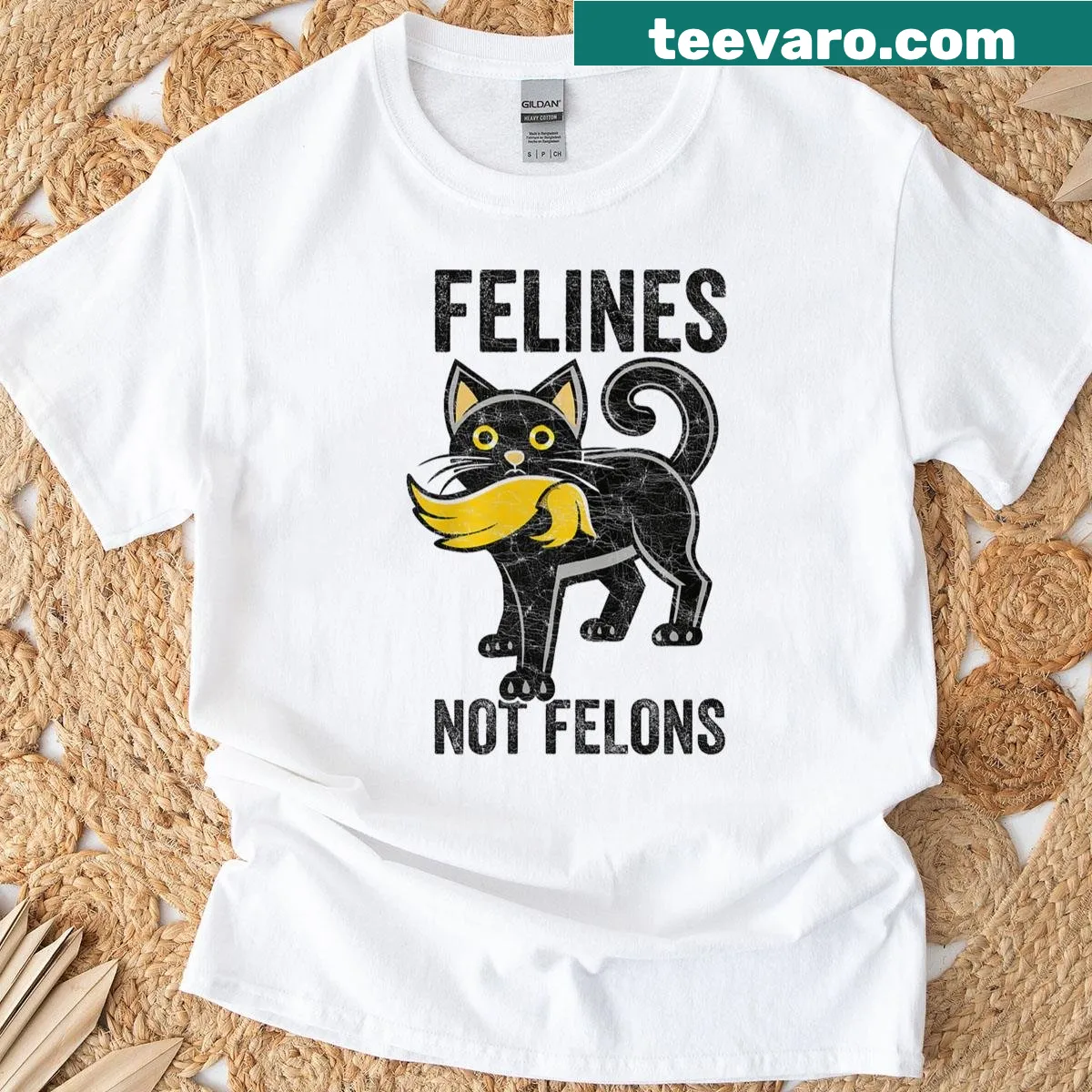 Cat illustration eating Trump hair with 'Felines Not Felons' text — on a men's t-shirt