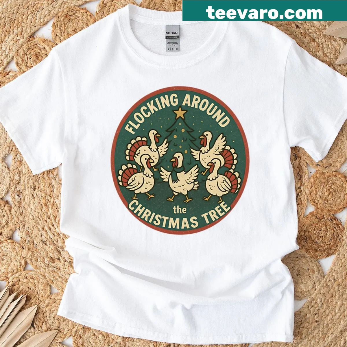 Cartoon turkeys around Christmas tree graphic on T-shirt — on a men's t-shirt