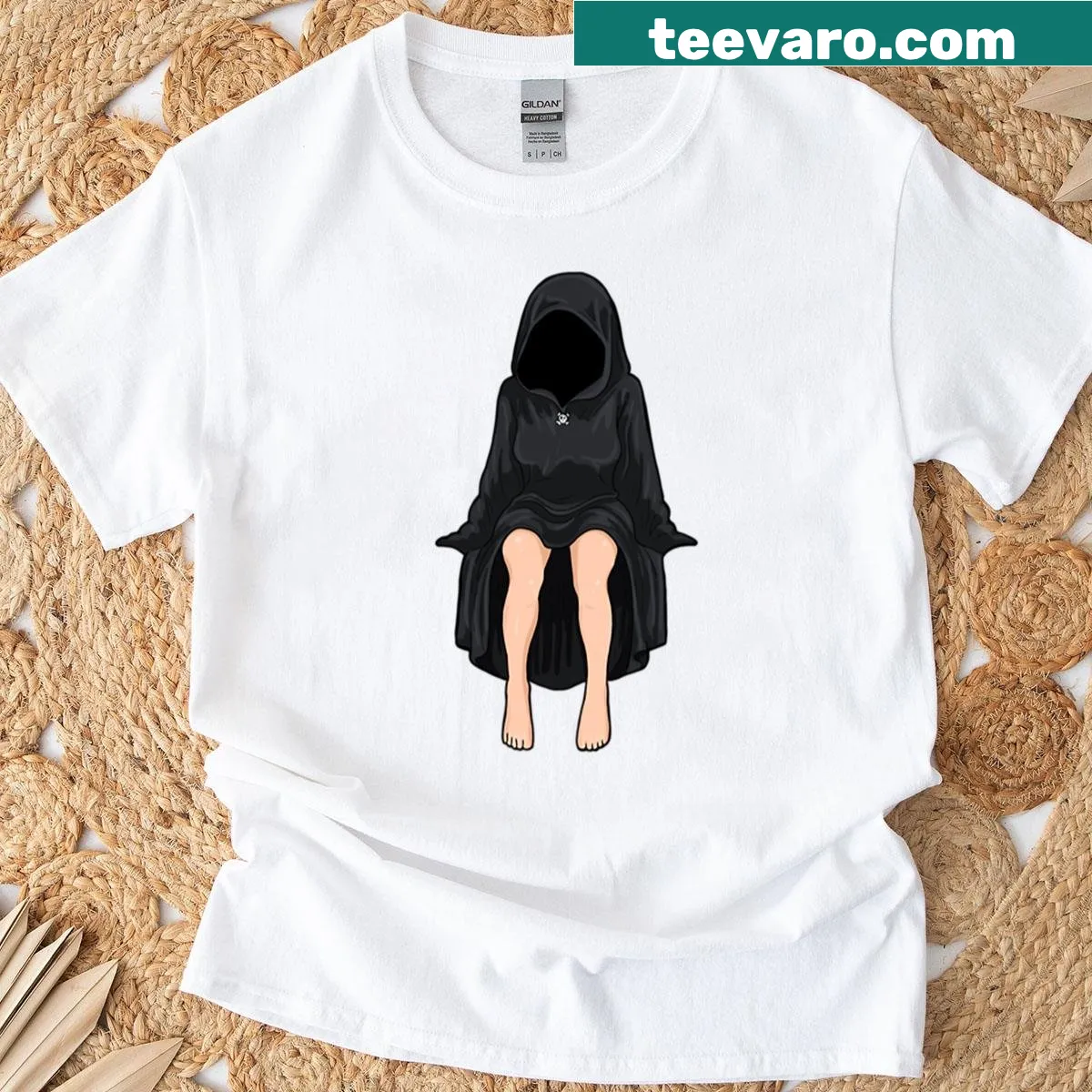 T-shirt featuring an edgy illustration of the Grim Reaper — on a men's t-shirt